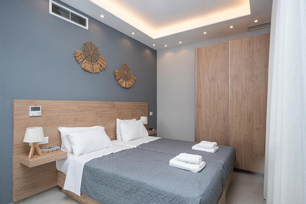 Υπνοδωμάτια και ιδιωτικά μπάνια της Maes Villa Crete